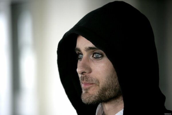 Musician Jared Leto in a black hood