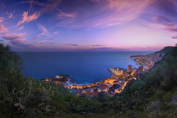 Monaco is a very beautiful city, dark blue sea in the evening