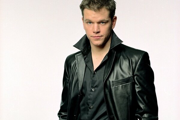 Matt Damon is a mysterious man in a leather jacket