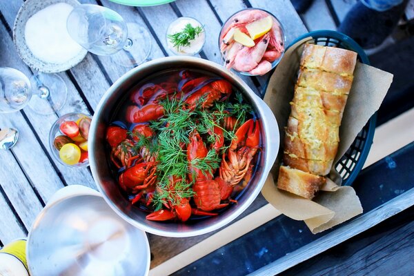 Shrimp and crayfish with dill in a plate