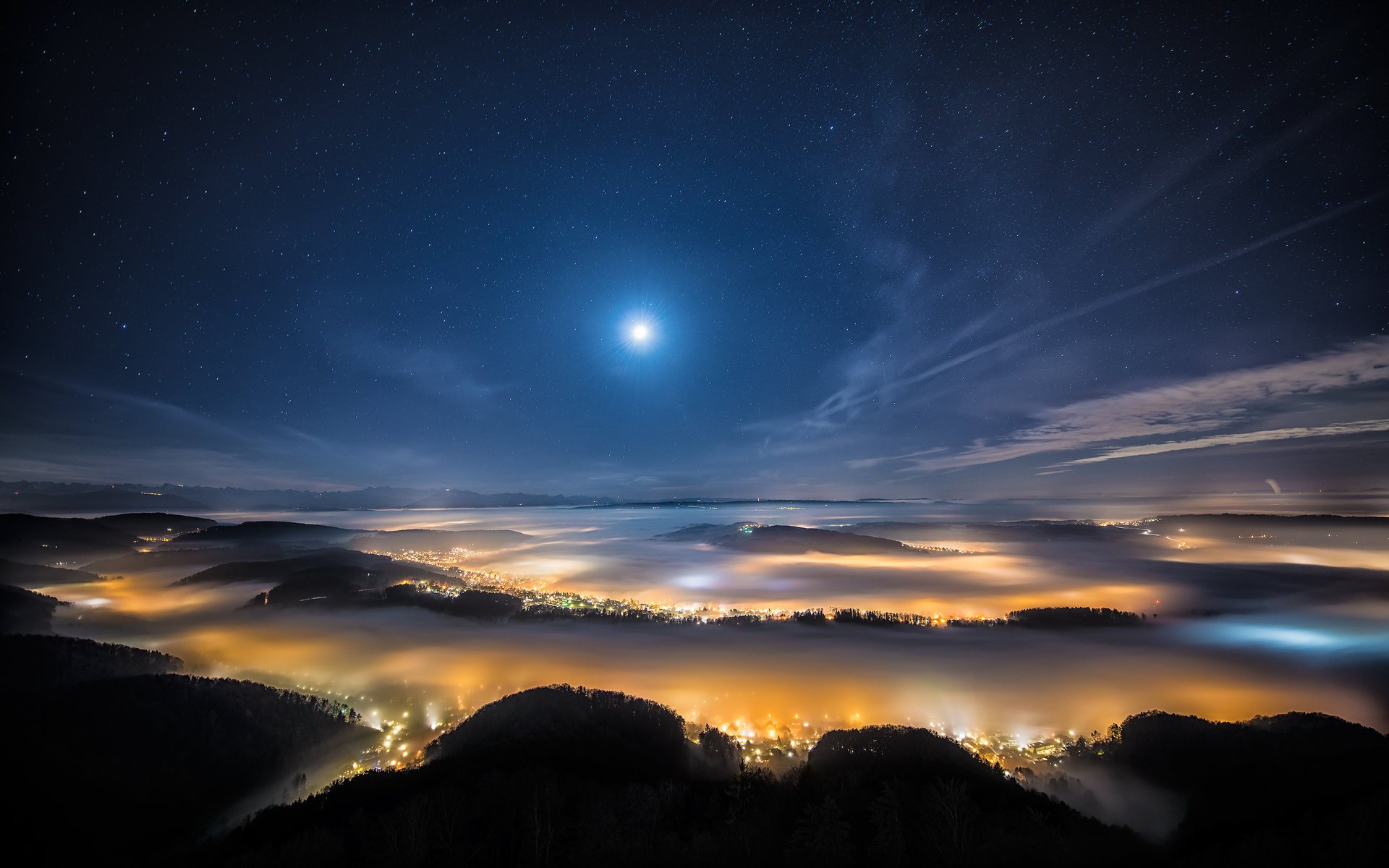 witzerland the city the evening alps mountains fog lights the sky the moon stars beautiful