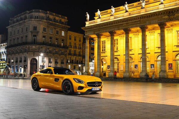 Yellow Mercedes Benz in the night city