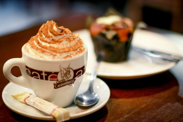 Dessert with coffee on the table in the cafe