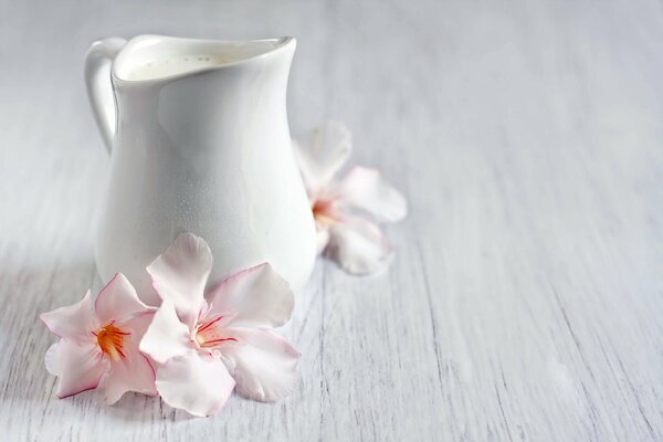 White jug with delicate flowers