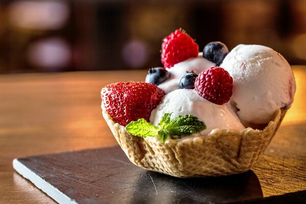 Delicious dessert with ice cream and fresh berries