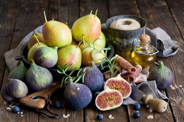 Still life of fruit with butter and ham