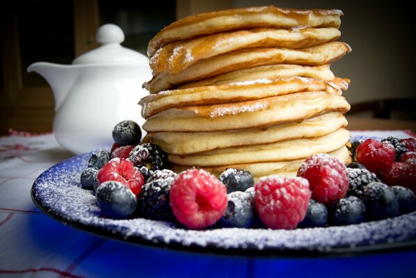 Pancakes with sprinkles and wild berries