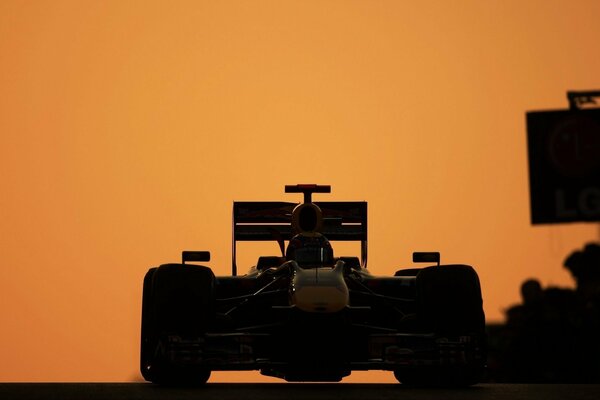 F1 sports racing is especially exciting at sunset