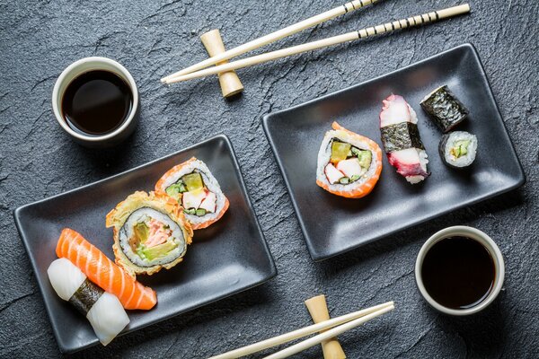 Composition of sushi with sauce