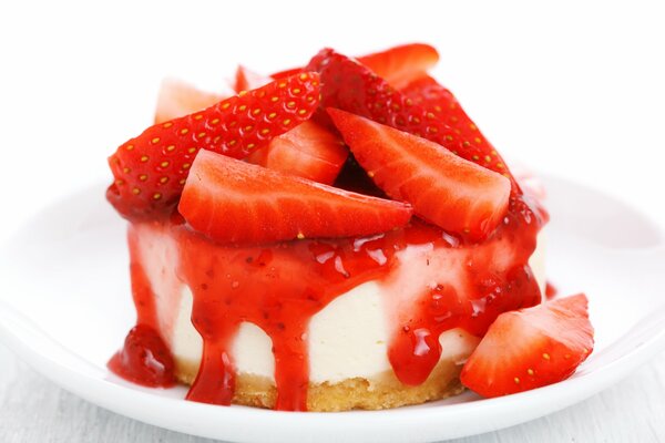 Dessert with cream decorated with fresh strawberries