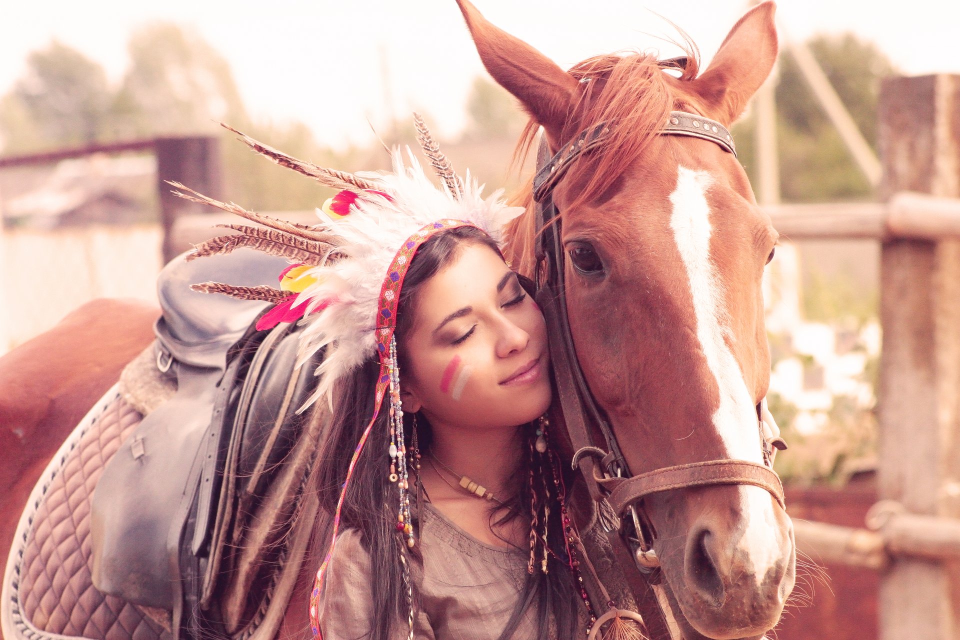 girl brown hair smile horse feathers fence