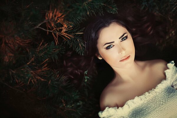 Portrait of Yulia Pushman in Christmas trees