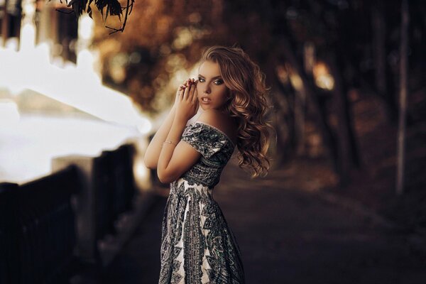 Beautiful girl on the background of nature