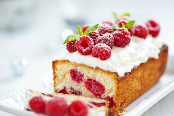 Beautiful pie with berries on cream