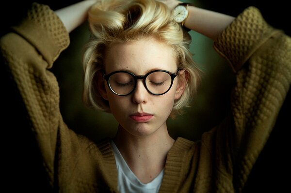 The girl with glasses. fatigue