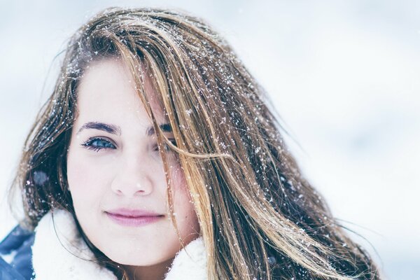 Winter smile from a beautiful girl