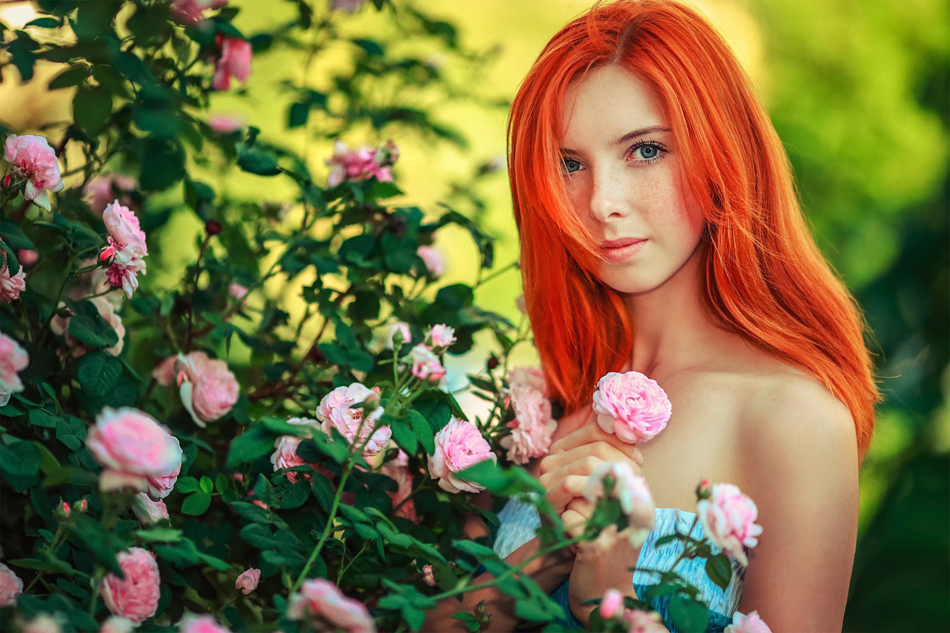 unny girl solar redhead freckles portrait flower