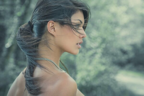 Portrait of a girl whose hair was ruffled by the wind