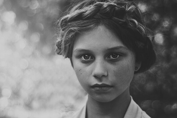 Black and white portrait of a girl with piercing eyes