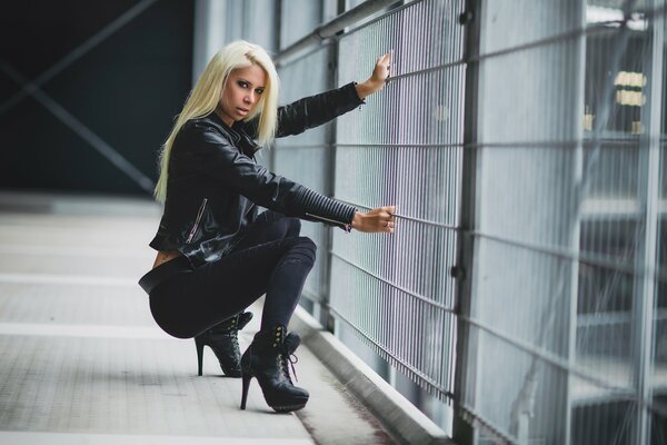 Photo of a girl. A girl in heels. Blonde
