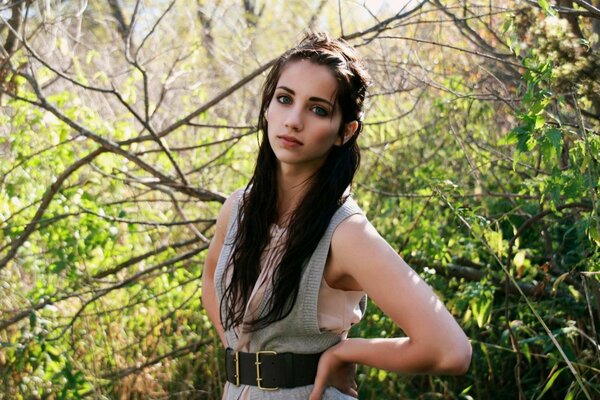 A girl in the forest. The brunette s look