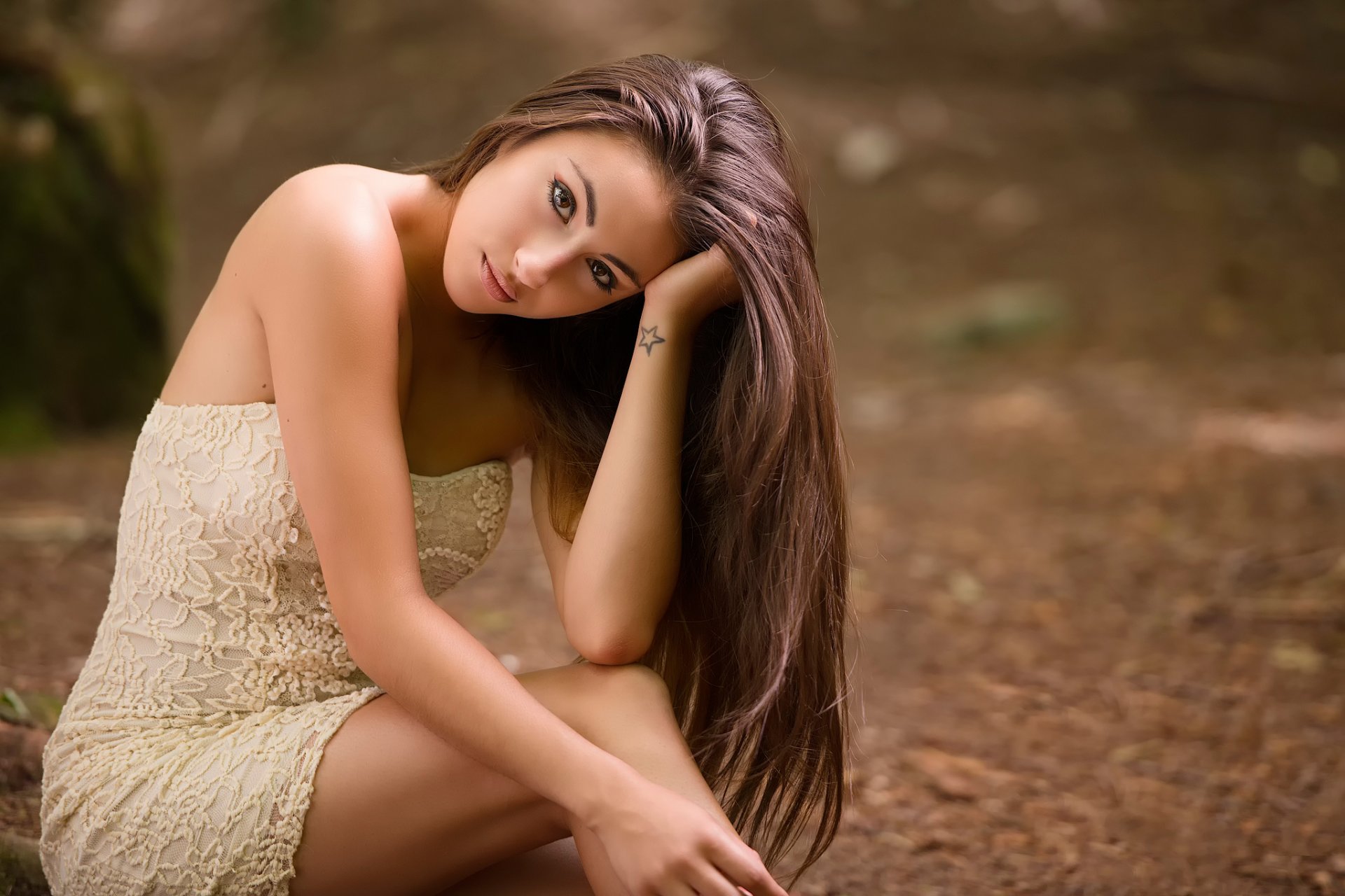 karolane brown-eyed hair view tattoo