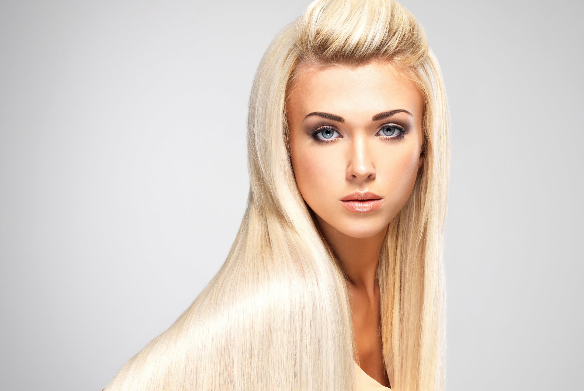 girl blonde hair long face view make-up eyes lips background model