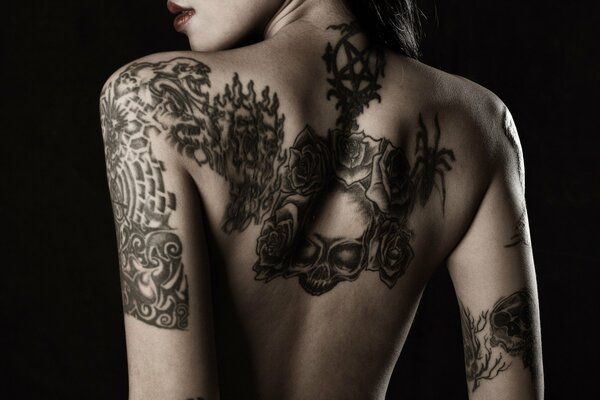 The back of a girl in a tattoo