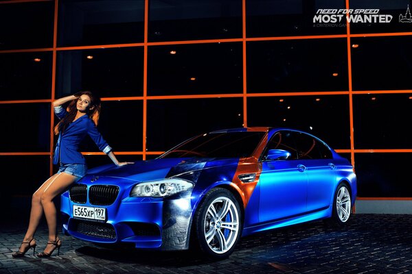 The girl advertises a blue bmw m 5