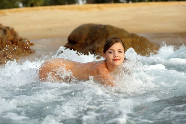 Sexy Emily in the foam of the sea