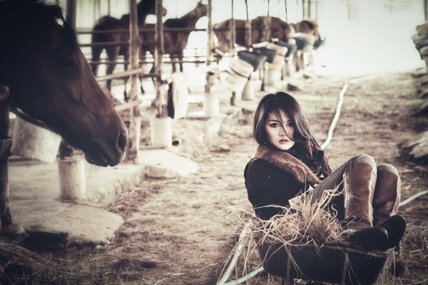 Photo shoot of a girl in a stable