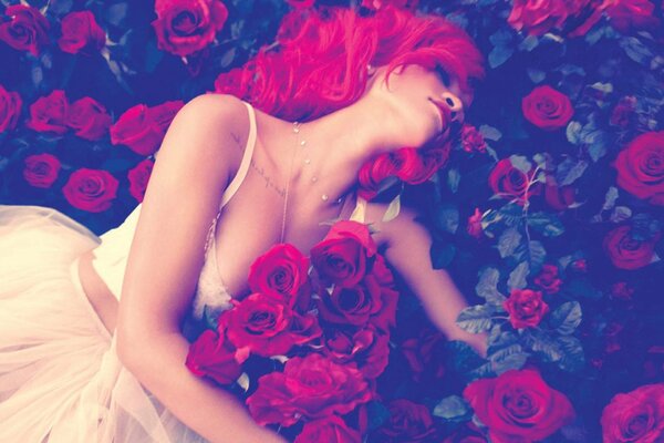 Photo of a girl against a background of bright red roses