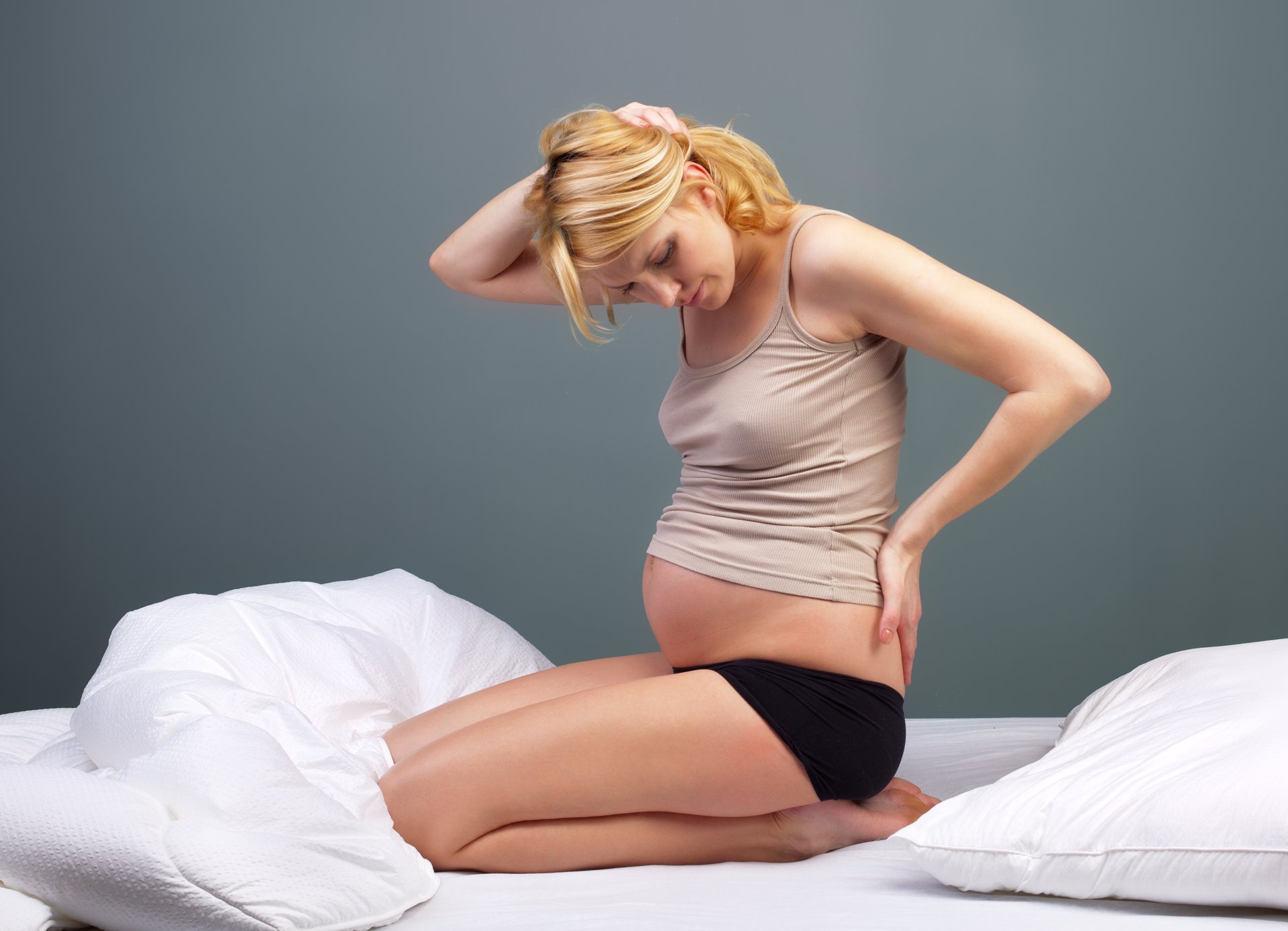 woman pregnant bed