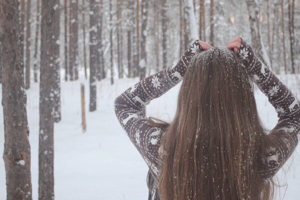 Image of a girl in a winter forest