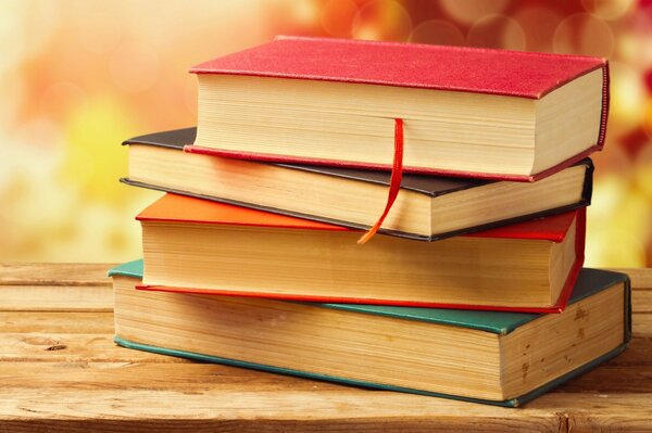 Vintage books on a wooden countertop