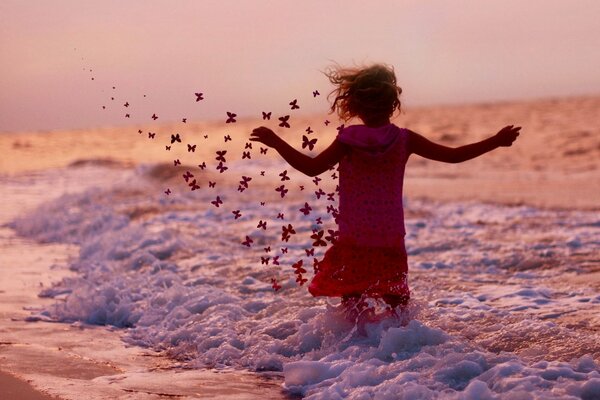 The sea breeze develops the girl s hair