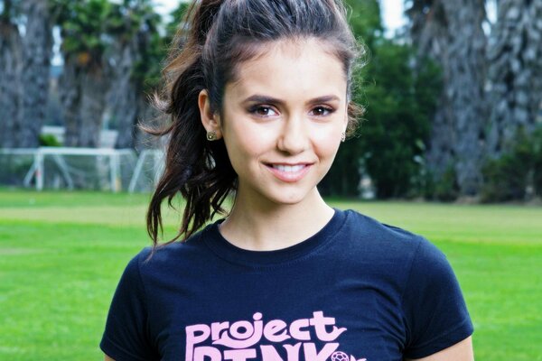 Nina Dobrev in a T-shirt