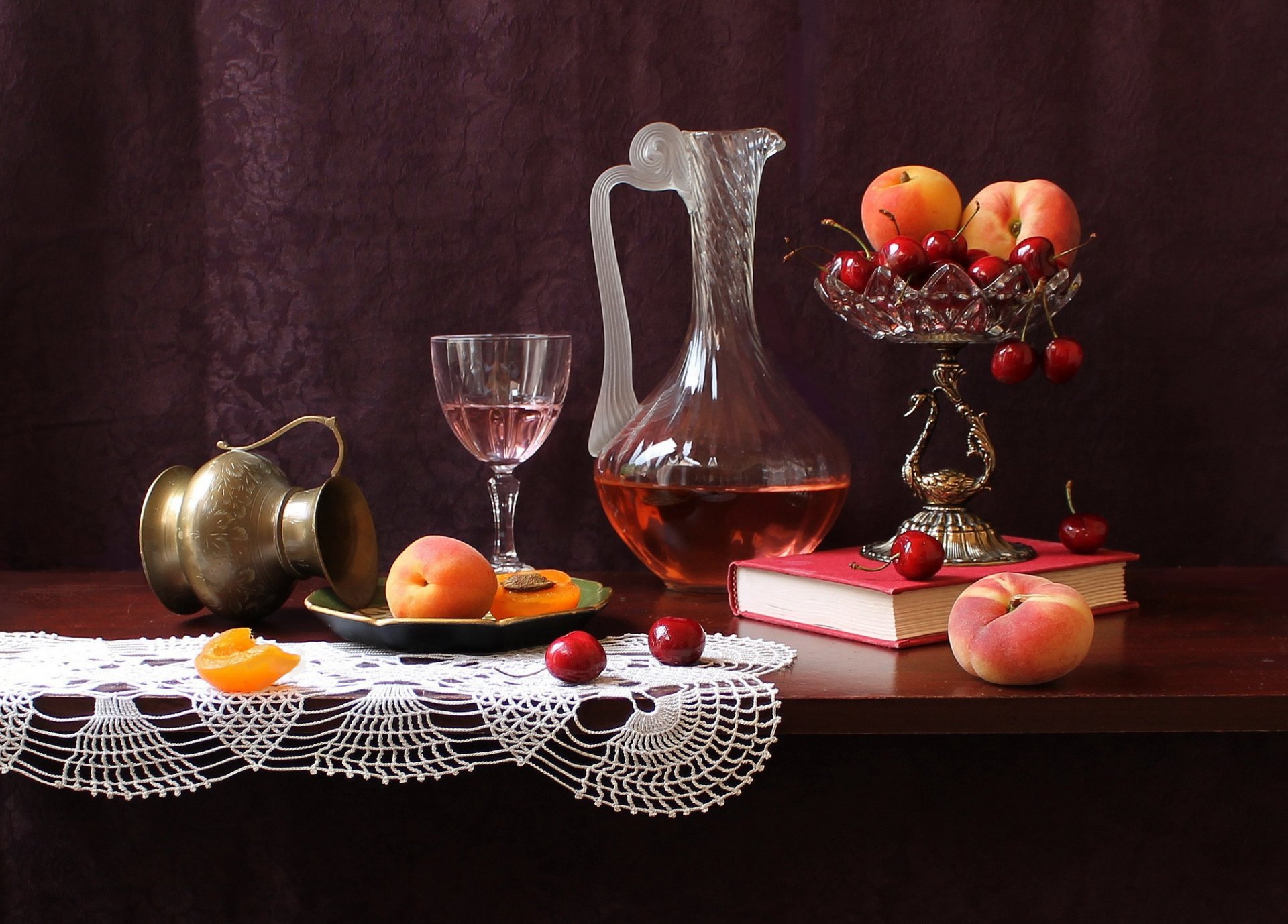 table book vase carafe fruits cherry peaches still life