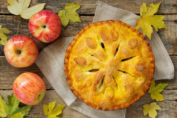 Autumn still life with pie and apples