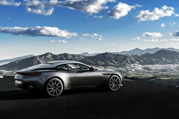 The supercar parked at a height under the clouds