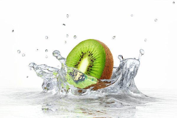 Ripe kiwi in a splash of water