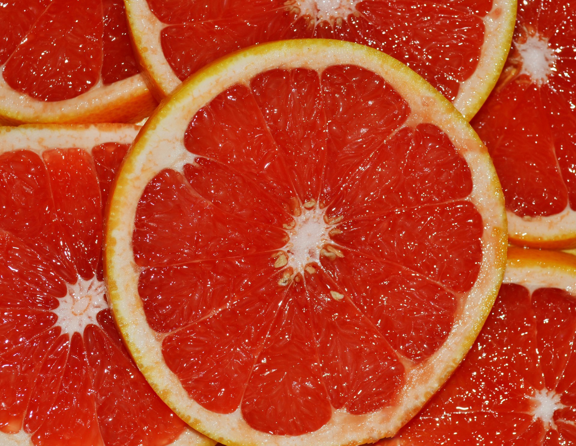 pomelo cítricos gajos rojo jugoso