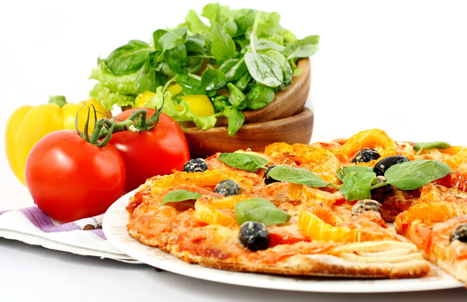 pizza italian cuisine tomato onion greens salad bell pepper olive meat cheese dish towel torment green pepper olive