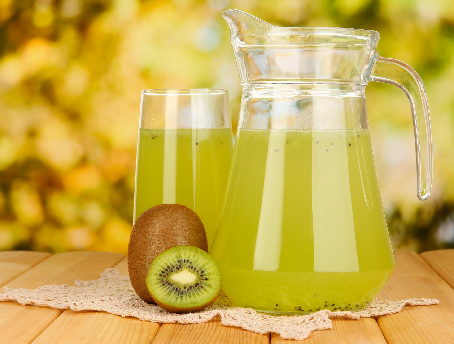 table napkin kiwi fruit glass juice carafe