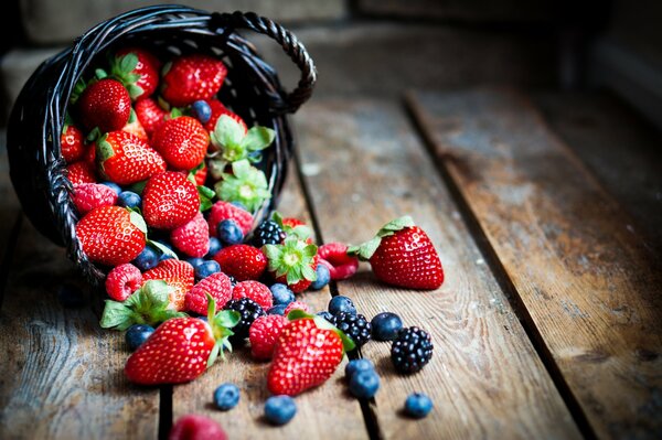 Crumbly berries, raspberries, blackberries, blueberries. Photo wallpaper of berries