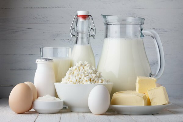 Rustic breakfast: milk, cottage cheese, eggs, butter