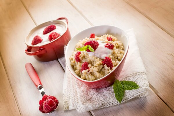 Porridge with raspberries cup spoon