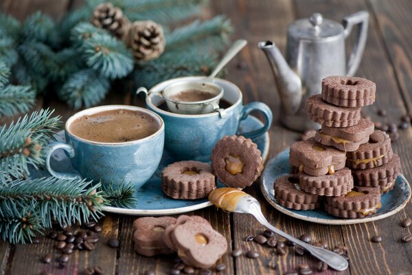 Winter. Dessert and a cup of coffee on a decorated table