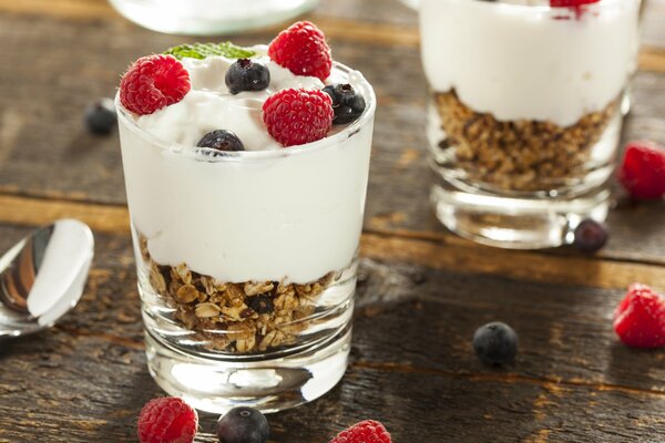 Dessert of oatmeal with cream and berries