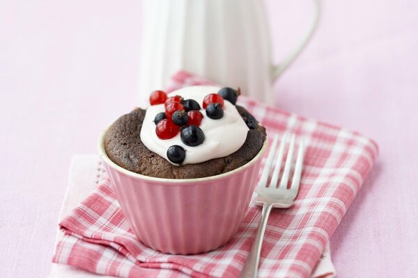 Cupcake in a mug with berries